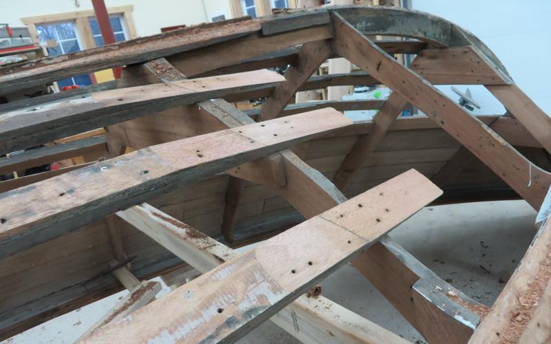 Rotted sections of bottom frames removed and prepped with a scarf joint for replacement.